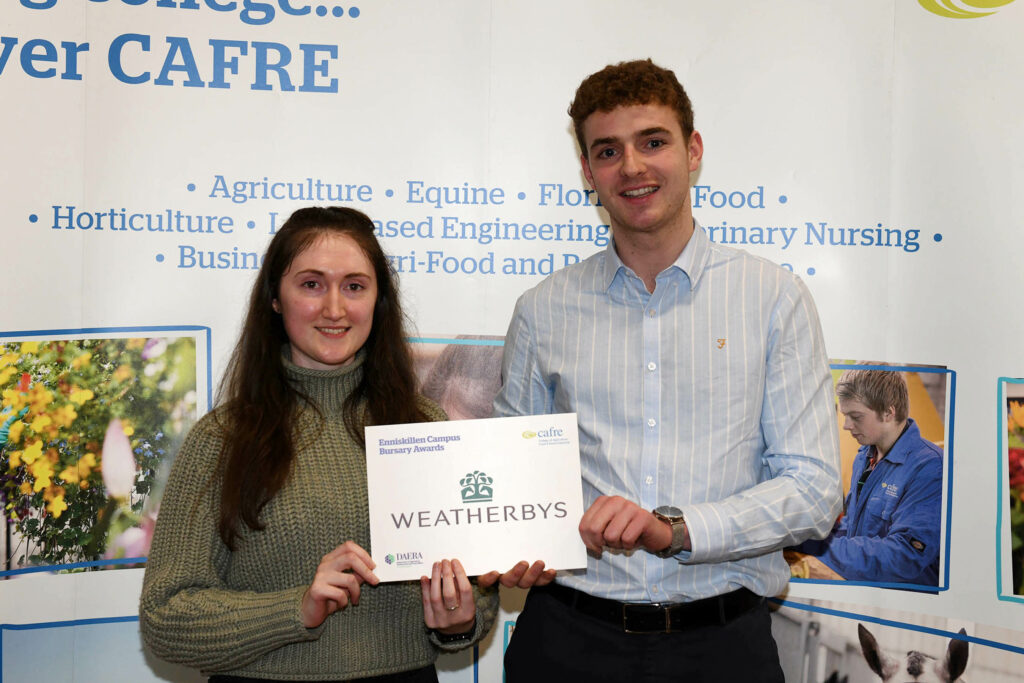 CAFRE Enniskillen Campus Certificate in Higher Education Equine student Joy Carleton (Magherafelt), receives her bursary from Jack Fogarty, Weatherbys.